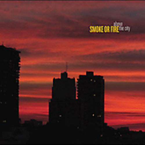 SMOKE OR FIRE  ABOVE THE CITY  - CD