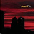 SMOKE OR FIRE  ABOVE THE CITY  - CD